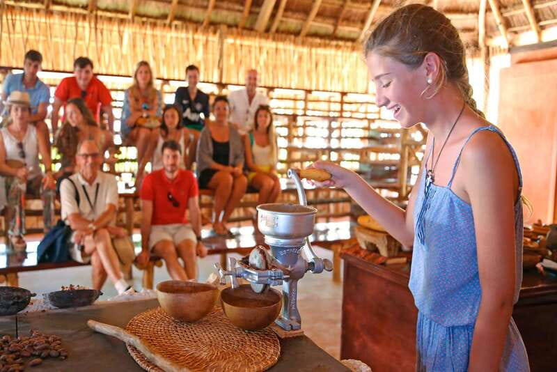 Cozumel: Chocolate Workshop at The Mayan Cacao Company - The hands-on magic: grinding cacao on a metate