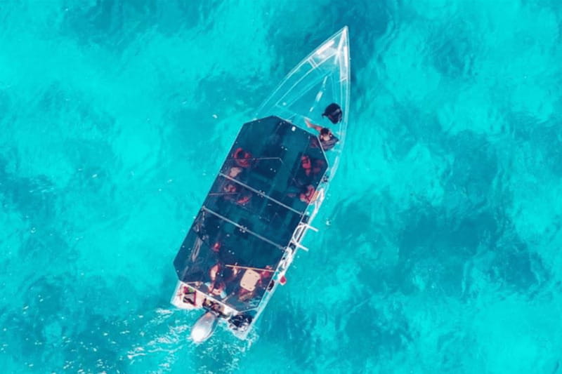 Explore the sea of cozumel in a transprent boat with drinks and snorkel. - Key things to know before you go